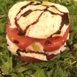 Burrata Cheese with Tomato Over Baby Arugula