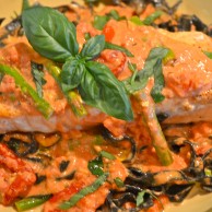 Seared Salmon over Black Ink Pasta with ala Vodka Sauce